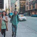 young adults walking on urban street