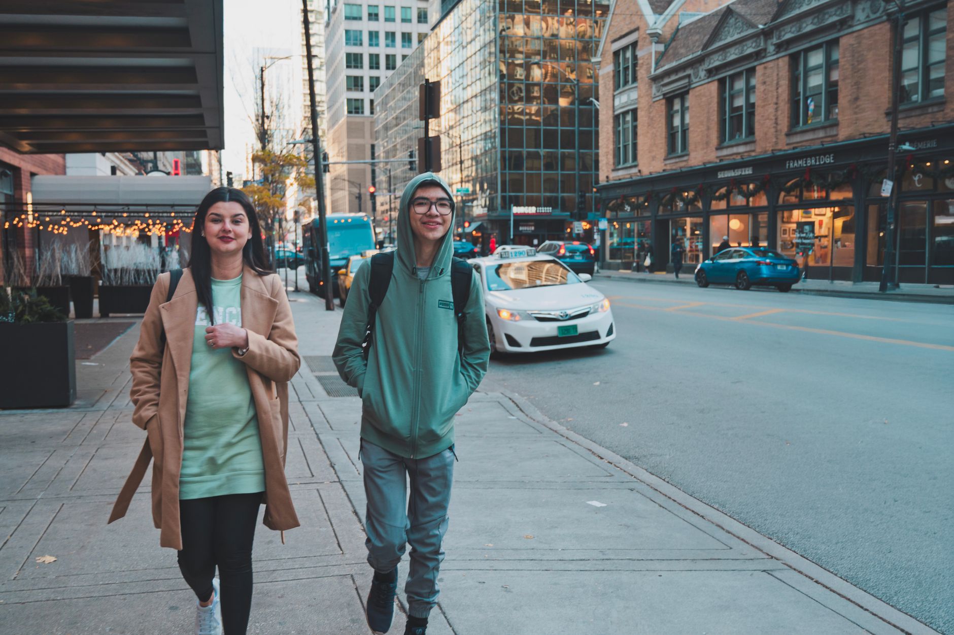 young adults walking on urban street