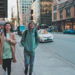 young adults walking on urban street